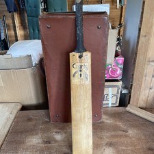 Vintage cricket bat by County