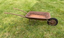Possibly Victorian small metal wheelbarrow. Garden architectural antique