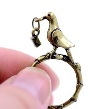 Vintage retro style antique effect bronze 3D pigeon dove with love letter ring