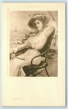 Postcard Gibson - Lady sitting