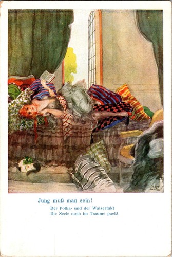 Woman reading bed curled - reading,