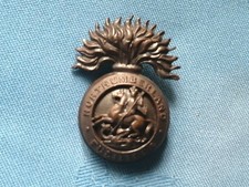 The Northumberland Fusiliers Officer Service Dress cap badge.