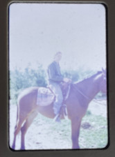 Man Riding Horse or Donkey