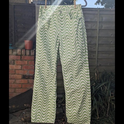 The ragged priest green wavy - ragged,