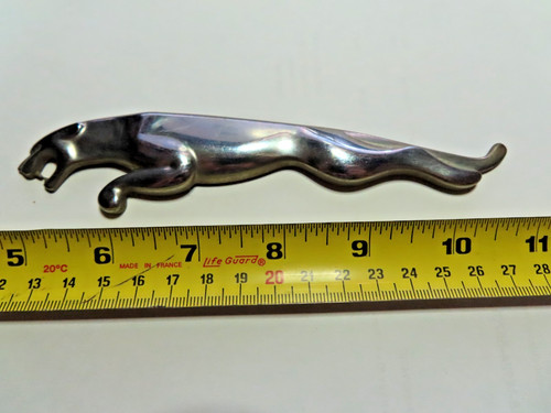 Leaping cat figure from - , jaguar