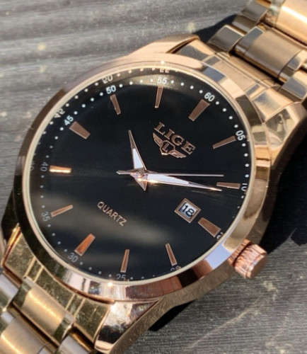 Rose gold watch with dual - with, tone