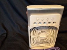 air fan cooler. can use water OR ice in the top for cooler air