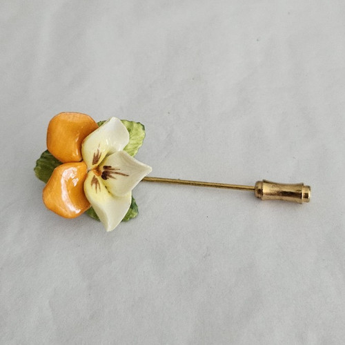 Gold tone metal flower - metal,