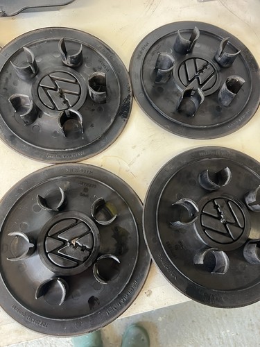 Centre caps genuine x4 - vw,