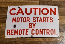 Rare vintage WWII 20" x 13" 'CAUTION MOTOR STARTS BY REMOTE CONTROL' enamel sign