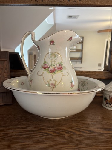 Antique water pitcher and - antique,