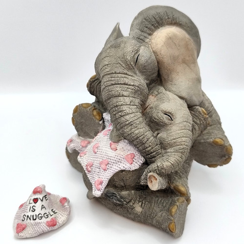 Tuskers love snuggle - love, a