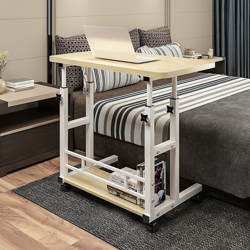 Height adjustable over bed - height,
