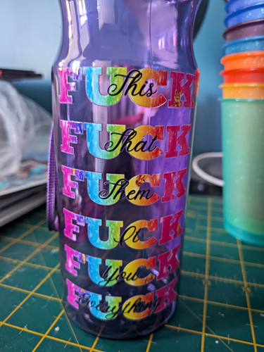 Purple plastic water bottle - plastic,