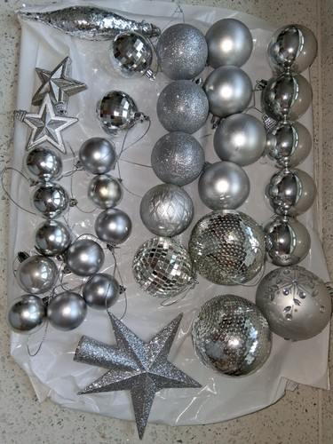 Silver decorations incl - 34,