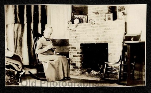 Older woman sitting - older,