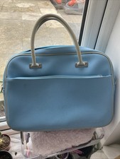 light blue & cream Lacoste