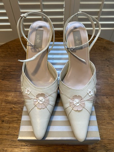Wallis cream and pale - cream,