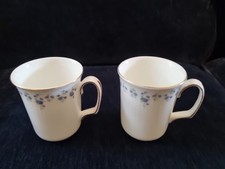 A fine pair of Royal Albert bone china mugs memory lane great condition