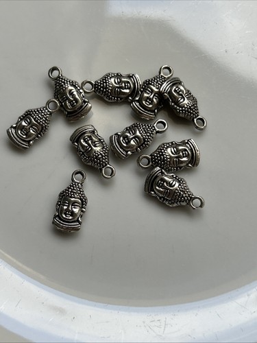 Buddha head charms in - 10,