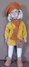 A 5 PIECE OCHRE CABLE SWEATER