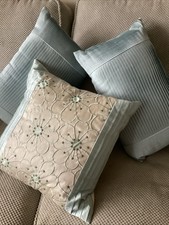 3 Cushion in duck egg blue. and Cream Satin Covers Square One 17inches x 17