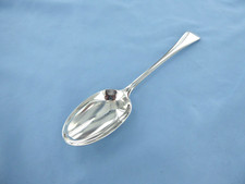 AN ANTIQUE STERLING SILVER OLD ENGLISH SERVING SPOON,LONDON 1919.