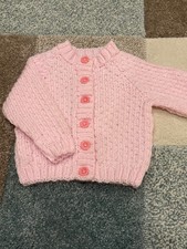 Hand Knitted baby pink baby