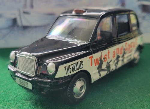 Beatles corgi tx1 london taxi - beatles,