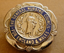 VINTAGE ENAMEL BADGE GENERAL