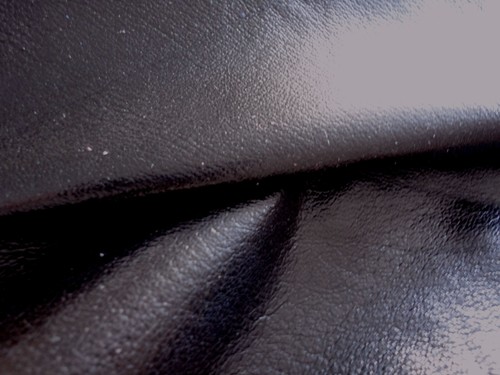Black coated pigskin leather - coated,