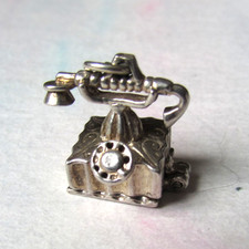 VINTAGE SILVER  OPENING TELEPHONE WITH FEATHER WRITING  QUILL  CHARM