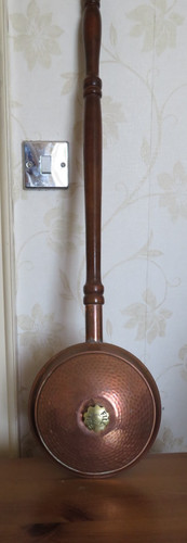 Antique hammered copper bed