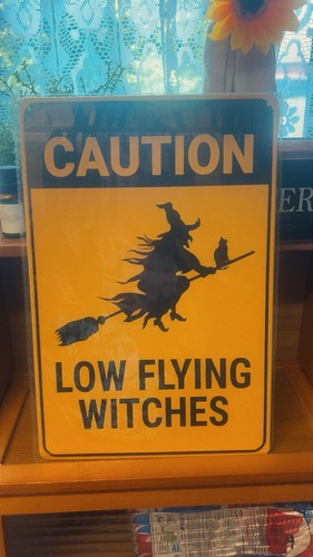 Caution low flying witches - low,
