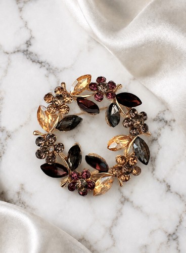 Gold tone crystal floral - crystal,
