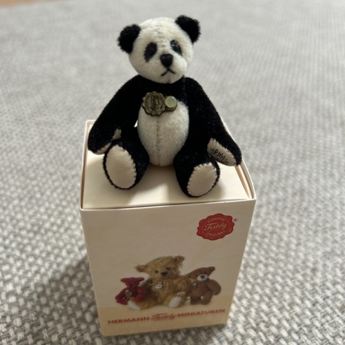 Hermann tiny miniature panda - hermann,