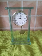 Clock, Stylish Glass Clock With Pendulum Encased In Plate Glass.