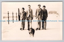 R799469 Four Young Men with Dog Jackson Faces Porthcawl