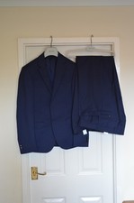 Moss Bros 2 piece suit. Never
