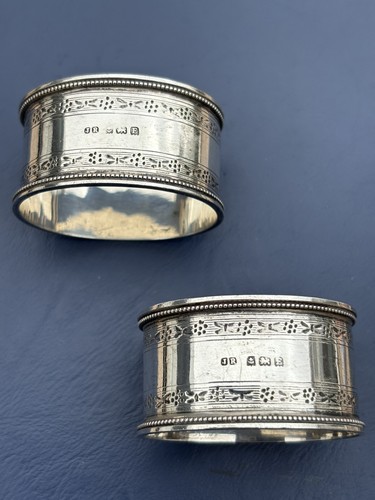 Pair silver napkin - of,