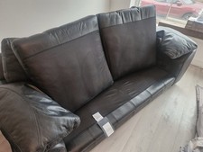 DFS black leather sofa, swivel chair and footrest.  Hardly used, Good Condition