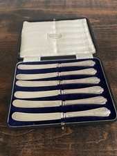 CASED SET OF SILVER HANDLED