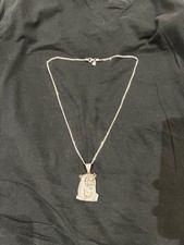 jesus piece pendant