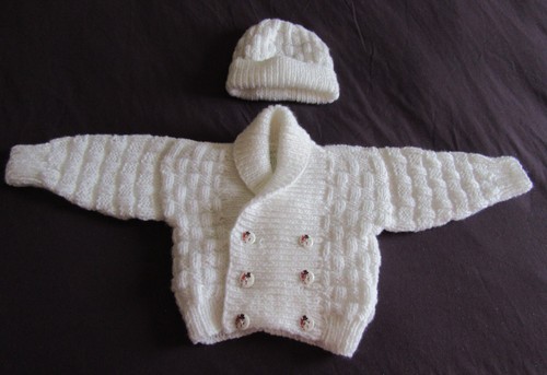 Hand knitted scroll neck
