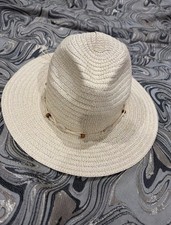 Straw Hat With Shells On A