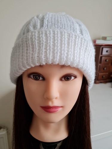 Hand knitted cable pom - hand,