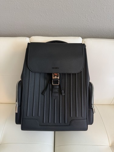 Rimowa never still leather - -,