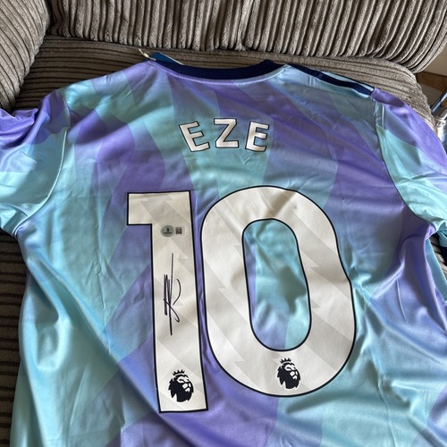Signed eze shirt with - signed,