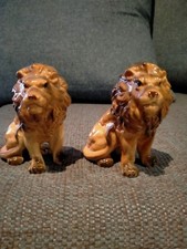 Pair Of Vintage Sitting Lion Ornaments