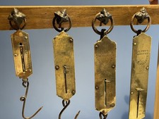 ANTIQUE GRADUATED BRASS SCALES